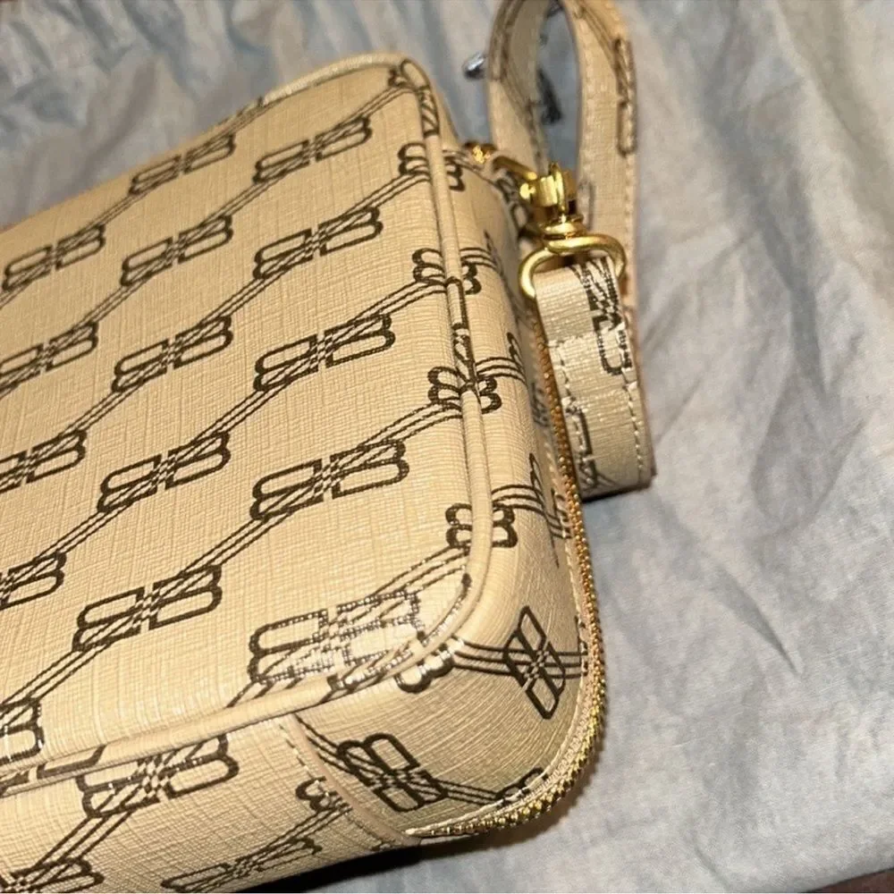 Authentic Balenciaga Signature BB Leather Pouch.